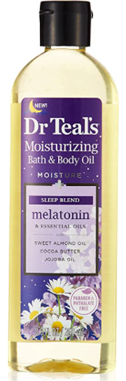dr. teals bath and body oil in a clear bottle